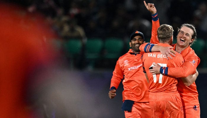 Netherlands Logan van Beek (2R) celebrates with teammates after taking the wicket of South Africas Heinrich Klaasen during the 2023 ICC Mens Cricket World Cup one-day international (ODI) match between South Africa and Netherlands at the Himachal Pradesh Cricket Association Stadium in Dharamsala, India, on October 17, 2023. (AFP)