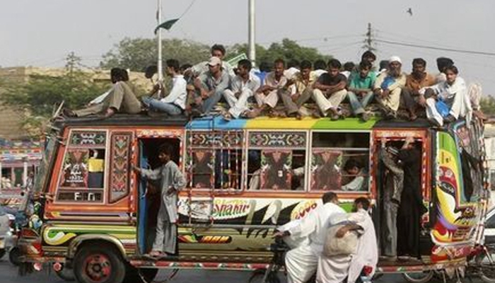 A crowded bus with people even on its top can be seen. — AFP/File