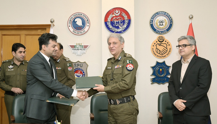 This picture shows moments after the MoU signing ceremony at the Central Police Office between the Punjab Police and the Lahore University of Management Sciences (LUMS) where IGP Dr Usman Anwar (c) is shaking hands with LUMS official on October 19, 2023. — X/@OfficialDPRPP