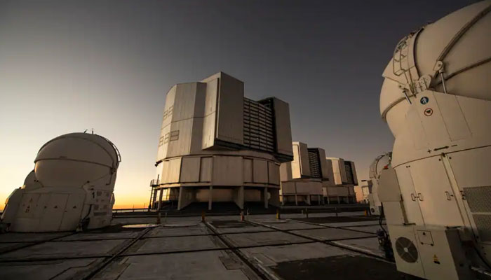 This picture shows the platform of the Very Large Telescope, with its four optical telescopes and four movable auxiliary telescopes, at the European Southern Observatorys Paranal Observatory in Chiles Antofagasta Region, June 20, 2022. AFP