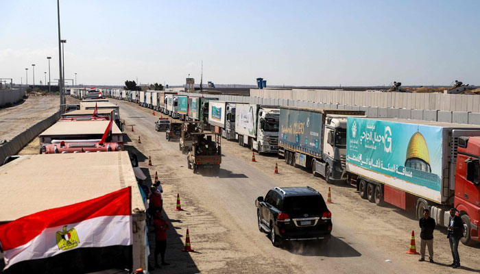 Egyptian army vehicles and a security detail escort the vehicle carrying the United Nations Secretary-General near the gate of the Egyptian side of the Rafah border crossing with the Gaza Strip in the east of North Sinai province on October 20, 2023 during a visit to oversee preparations for the delivery of humanitarian aid to the war-torn Palestinian enclave. — AFP