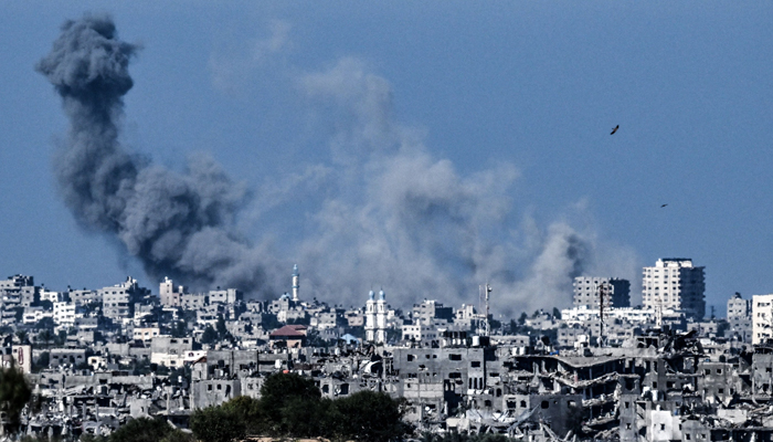 A picture taken from the Israeli side of the border with the Gaza Strip shows smoke rising over the northern-western part of the Palestinian enclave during an Israeli bombing on October 21, 2023. — AFP