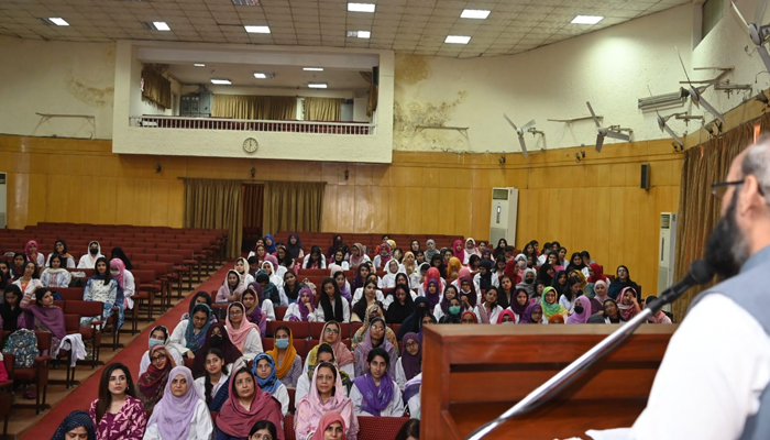 Participants can be seen listening to a speaker during a seminar in connection with World Anatomy Day in Fatima Jinnah Medical University on October 21, 2023. — facebook/Fatima Jinnah Medical University