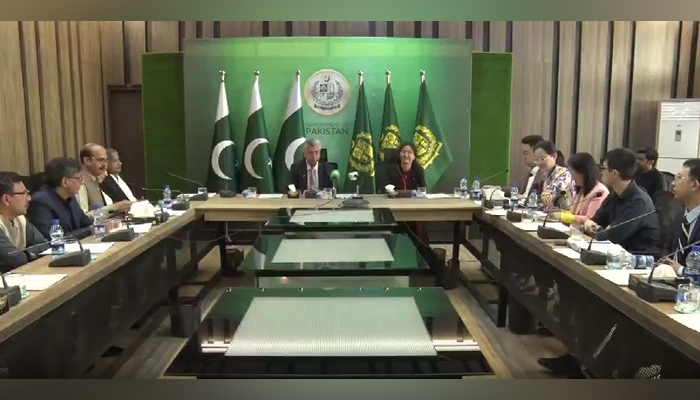 China’s Political Counsellor Bao Zhong (right) with the Caretaker Federal Minister for Information Murtaza Solangi in Islamabad on October 21, 2023. — APP