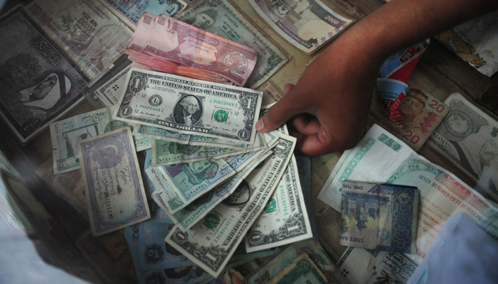 A representational image showing a number of foreign currency notes. — AFP?File