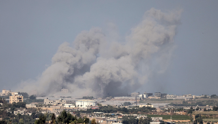 A picture taken from the southern Israeli city of Sderot on October 20, 2023, shows smoke ascending over the northern Gaza Strip following an Israeli strike. — AFP