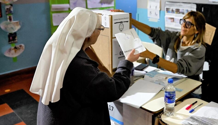 A nun casts her vote at the polling station in Tigre, Buenos Aires, during the Argentine presidential election on October 22, 2023. — AFP