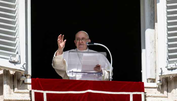 Pope Francis leads the Angelus prayer from his window at the Vatican, October 22, 2023. —Reuters