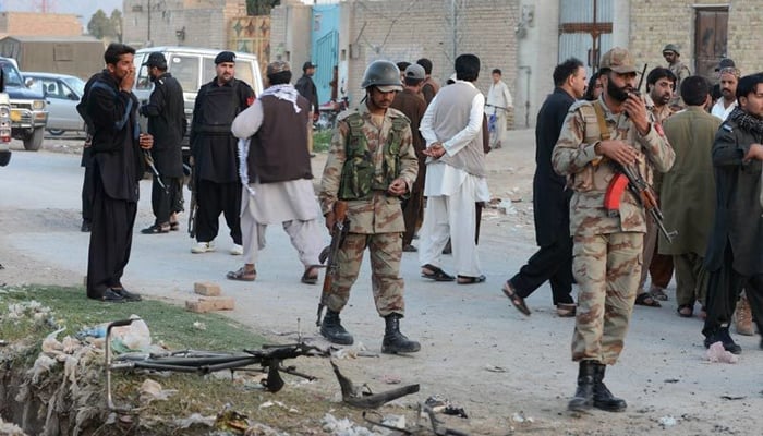 Frontier Corps soldiers can be seen walking in KP. — AFP/File