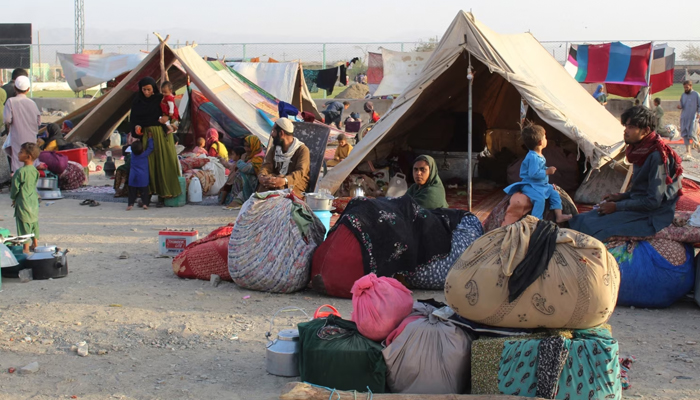 Afghan refugees rest in tents at a makeshift shelter camp in Chaman, a Pakistani town on the border with Afghanistan. — AFP/File