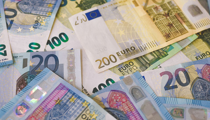 Euro banknotes are seen in this image. — Unsplash