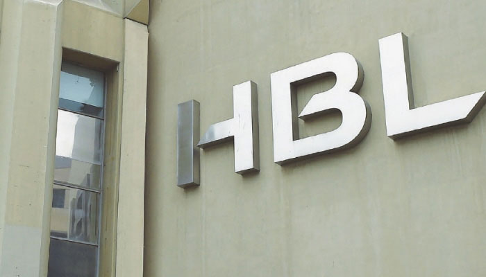 The logo of Habib Bank Limited is pictured on the side of its building in Karachi on August 29. — AFP