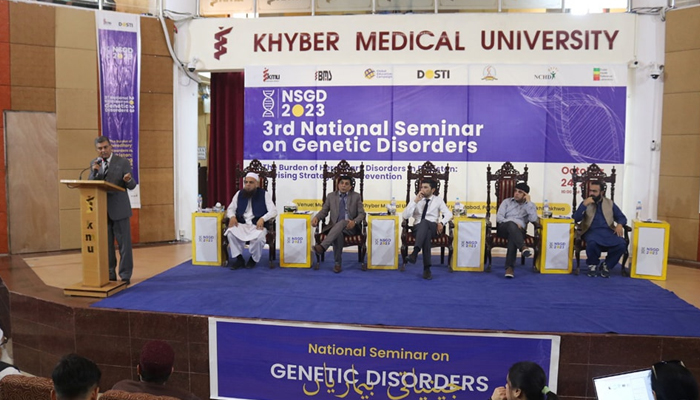 This photograph released on October 25, 2023, shows penalists sitting on the stage during a seminar on genetic disorders organised by the Khyber Medical University in Peshawar. — Facebook/Khyber Medical University, Peshawar, Khyber Pakhtunkhwa