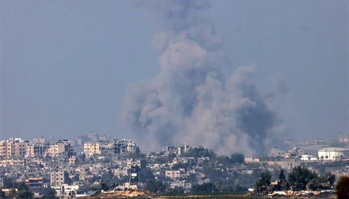A picture taken from the southern Israeli city of Sderot shows smoke ascending over the northern Gaza Strip following an Israeli strike on October 25, 2023. — AFP
