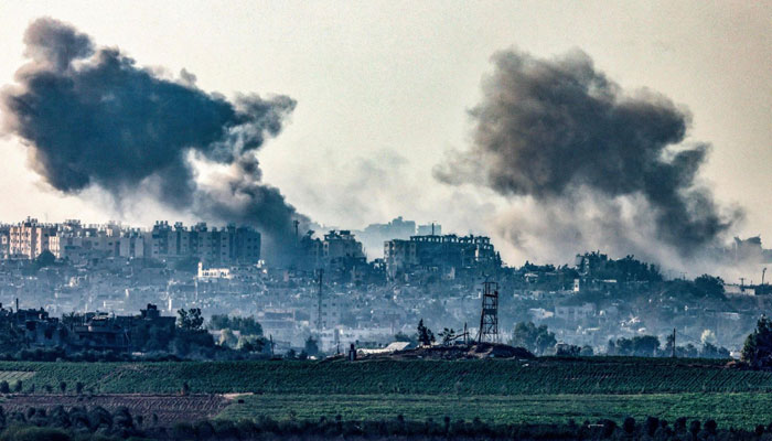 This picture taken from the southern Israeli city of Sderot shows smoke ascending over the northern Gaza Strip following an Israeli strike, Oct. 25, 2023. — AFP
