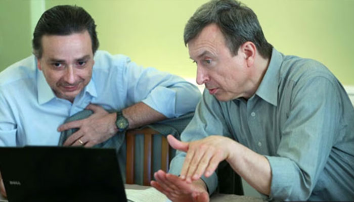 Physicist Anatoly Gubanov (right). rferl.org/