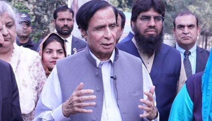 Pakistan Tehreek-e-Insaf (PTI) President Pervaiz Elahi gestures as he speaks in front of the media in this picture released on December 12, 2022. — Facebook/Dr Yasmin Rashid