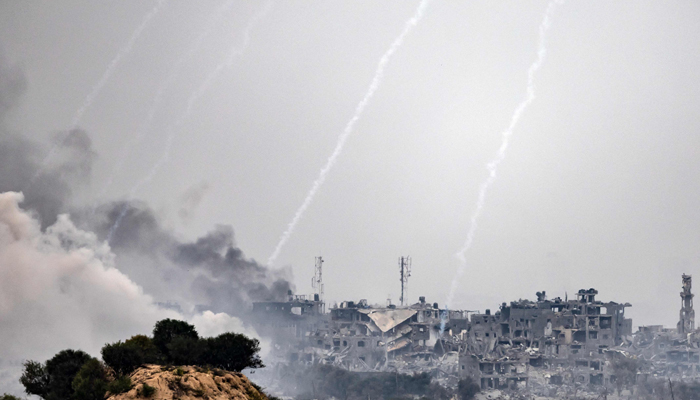 This image taken from the Israeli border with the Gaza Strip on October 29, 2023, shows rockets being fired from Gaza towards Israel amid ongoing battles. — AFP