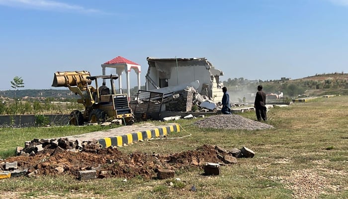 Rawalpindi Development Authority (RDA) officials during an operation against an illegal housing scheme in this picture released on October 18, 2023. — Facebook/Rawalpindi Development Authority