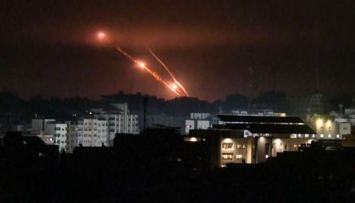 This grab from AFP TV footage shows a salvo of rockets fired from Gaza City on October 27, 2023. — AFP