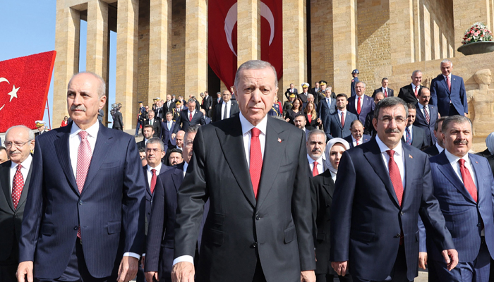 Turkish President Recep Tayyip Erdogan (C) and state officials visit Anitkabir, the mausoleum of Turkish Republics Founder Mustafa Kemal Ataturk, to mark the 100th anniversary of the Republic in Ankara, on October 29, 2023. — AFP
