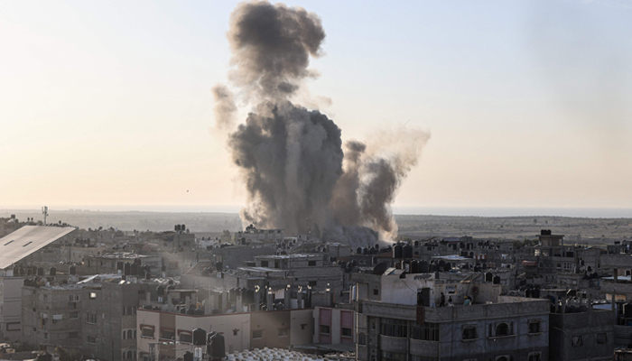 Smoke and dust rise following an Israeli air strike in Rafah, in the southern Gaza Strip on October 30, 2023. — AFP