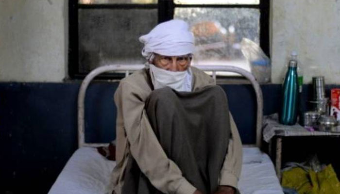 A file photo of a patient sitting on a hospital bed. — AFP