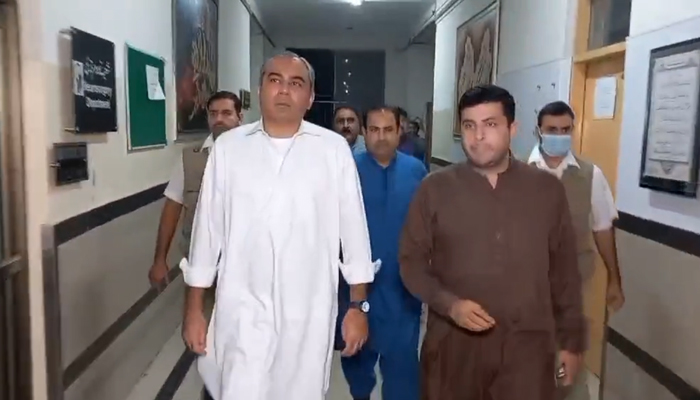 Chief Minister Mohsin Naqvi can be seen during his late-night visit to DHQ Hospital Sheikhupura in this still taken from a video released on October 30, 2023. — X/@MohsinnaqviC42