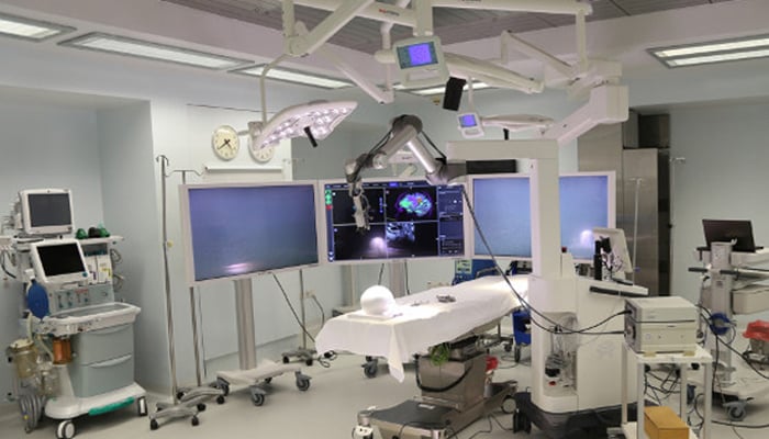 A representational image showing high-technology equipment for brain surgery. — Agha Khan University website