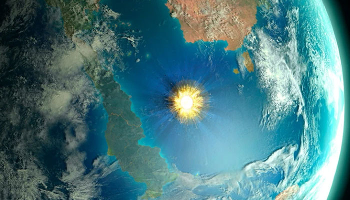 The asteroid impact (illustration) produced the Chicxulub crater in what is now Mexico.— Science Photo Library
