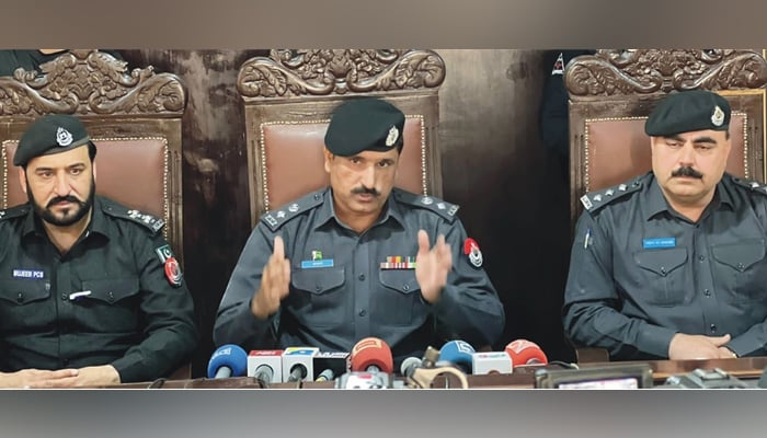 District Police Officer Shafiullah Gandapur speaks during a press conference at Mingora Police Station alongside other officers on October 31, 2023. — Facebook/Khyber Pakhtunkhwa Police