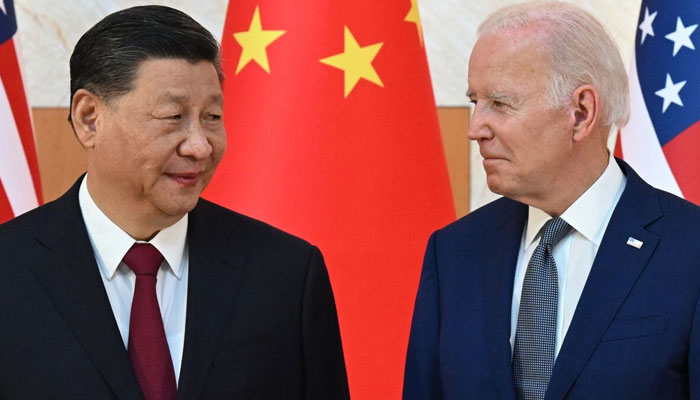 Chinas President Xi Jinping and US President Joe Biden in November 2022. — AFP/File