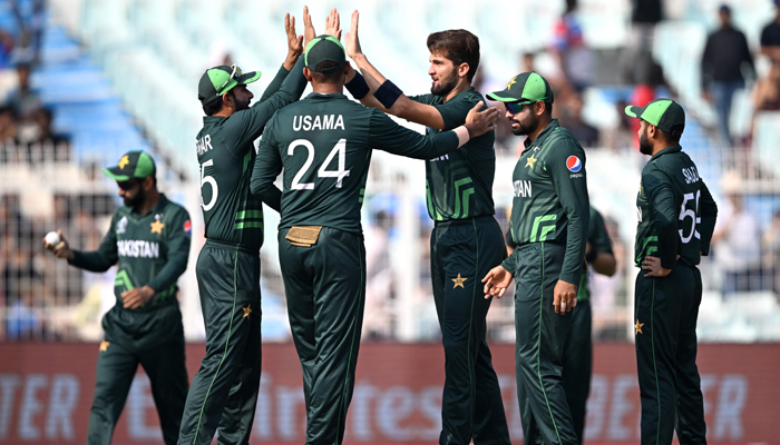 Shaheen Shah Afridi (3R) celebrates with teammates after taking the wicket of Bangladeshs Hasan during the 2023 ICC Cricket World Cup ODI between Pakistan and Bangladesh at the Eden Gardens in Kolkata on October 31, 2023. — AFP