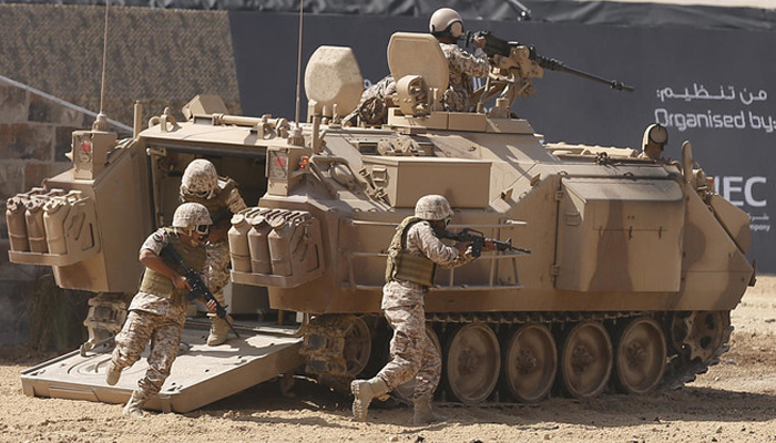 Members of the UAE’ armed forces take part in a military show launching the International Defense Exhibition and Conference (IDEX) in Abu Dhabi. — AFP/File
