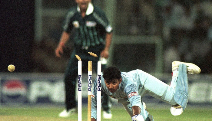 In this file photograph taken on April 4, 1999, Indian batsman and team captain Ajay Jadeja dives to make his ground in a game against Pakistan. — AFP File