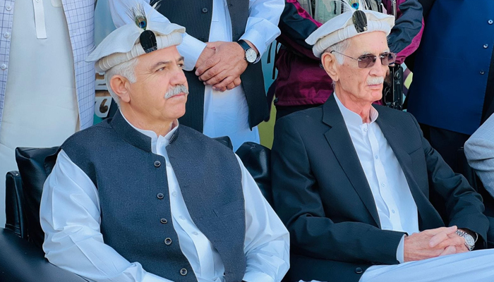 Vice-Chairman of Pakistan Tehreek-e-Insaf Parliamentarian Mahmood Khan (L) sits with the chief of PTI-P Parvez Khattak in this image released on October 31, 2023. — Facebook/PTI-P