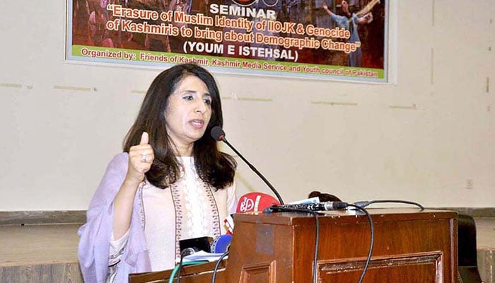 The image shows Foreign Office Spokesperson Ms. Mumtaz Zahra Baloch addressing Seminar on “Erasure of Muslim Identity of IIOJK& Genocide of Kashmiris to bring about Demographic Change” (Youm e Istehsal) organized by Friends of Kashmir at Kashmir House on Aug 5, 2023. — APP