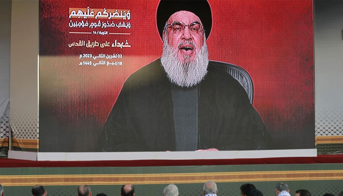 Hezbollah leader Hassan Nasrallah delivers his first speech since the Gaza war erupted almost four weeks ago, broadcast as part of an event in Beiruts southern suburbs, a stronghold of the Iran-backed militant group. Ahmad Al-Rubaye / AFP