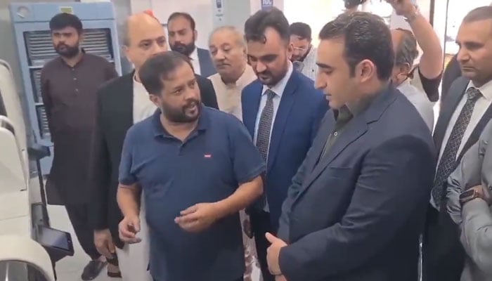 Bilawal is being briefed at the inauguration of a free diagnostic clinical laboratory of JDC Foundation at the Numaish intersection in this still taken from a video. — X/MajidMughal01 video.