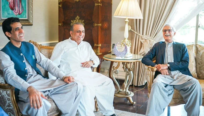 (From left to right) Former PTI leaders Awn Chaudhry, Aleem Khan and Jahangir Khan Tareen are sharing a light moment during a meeting. — Facebook/Jahangir Khan Tareen