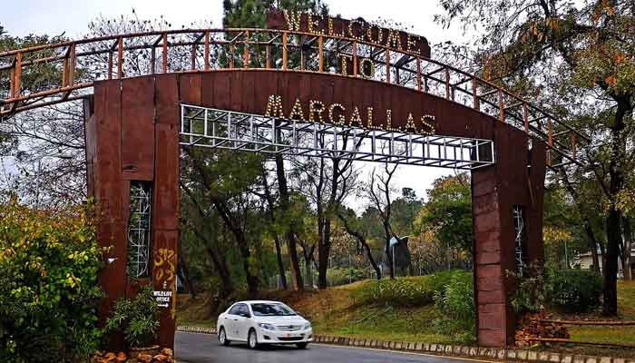 car can be seen entering in the Margalla Park. —APP File