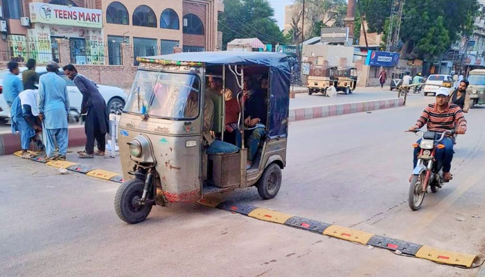 A rickshaw is seen passing over a speed breaker in Hyderabad. — Facebook/Cantonment Board Hyderabad - CBH