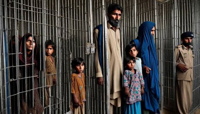 Afghan refugees can be seen being released from jail. — Friday Times