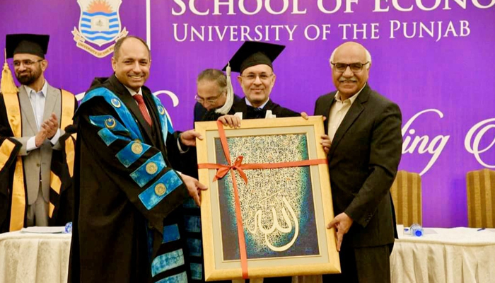 Chairman Benazir Income Support Programme (BISP) and Founder Akhuwat Foundation Dr Amjad Saqib (R) poses for a picture on November 5, 2023. — Facebook/University of the Punjab