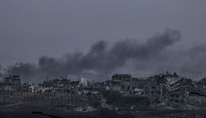 This picture taken from Sderot along the border with the Gaza Strip on November 5, 2023, shows black smoke billowing during an Israeli strike on the Palestinian enclave. — AFP