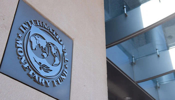 This photo shows a sign of the International Monetary Fund (IMF) in Washington, DC. — AFP/File