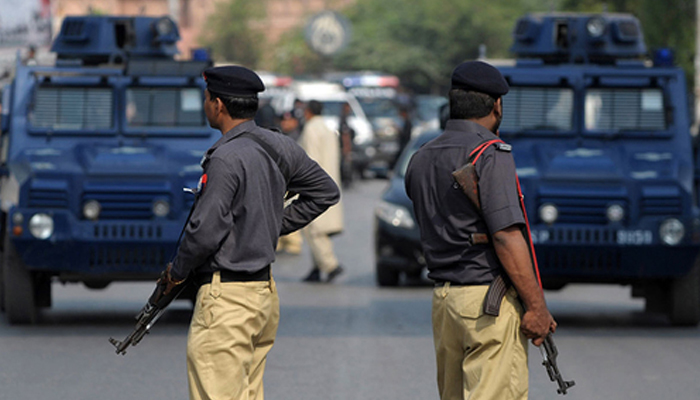 This representational image shows police personnel standing guard. — AFP/File