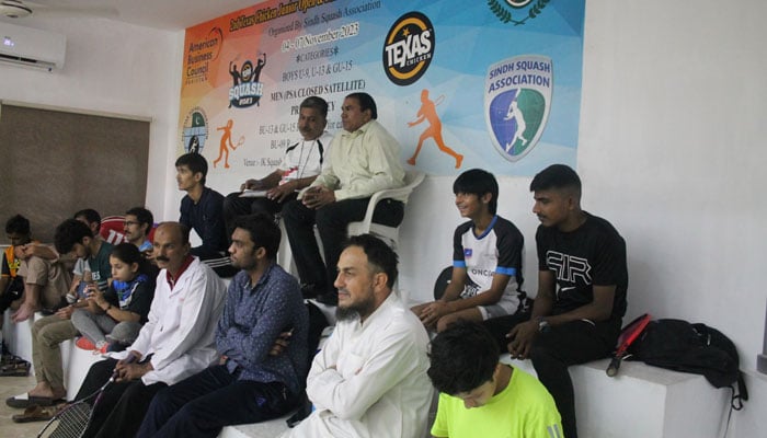 The image shows people witnessing the final of PSA Satellite event in the 2nd Texas Chicken Squash Open at NCC. — Facebook/muhammadamir.khan.357