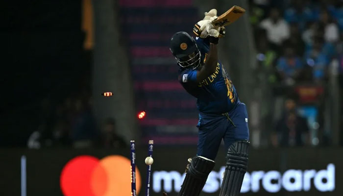 Sri Lankas Angelo Mathews is clean-bowled by Indias Mohammed Shami. — AFP File