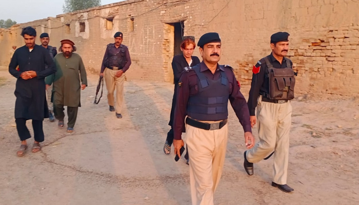 Police officials during a search in the Nowshehra district in this image released on November 5, 2023. — Facebook/Khyber Pakhtunkhwa Police